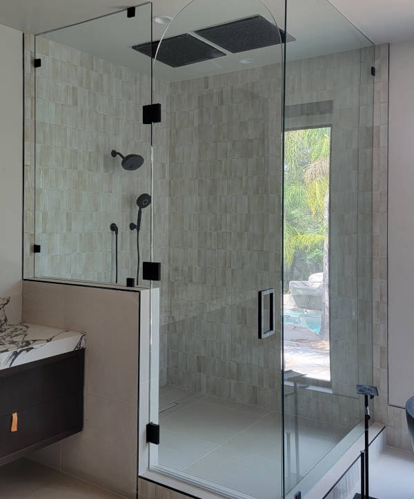 frameless-full-glass-shower-enclosure-modern-bathroom-westoaks Modern bathroom featuring a frameless full glass shower enclosure by Westoaks Glass & Mirror.